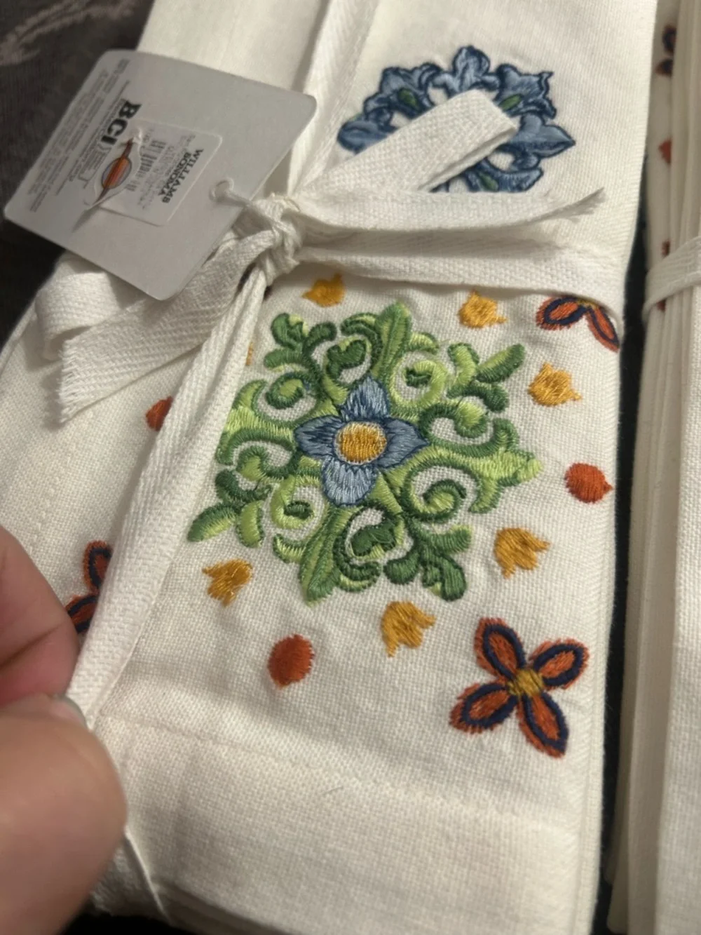 NWT Williams Sonoma White Dinner Napkins with Blue, Green and Yellow Embroidery - Picture 5 of 6